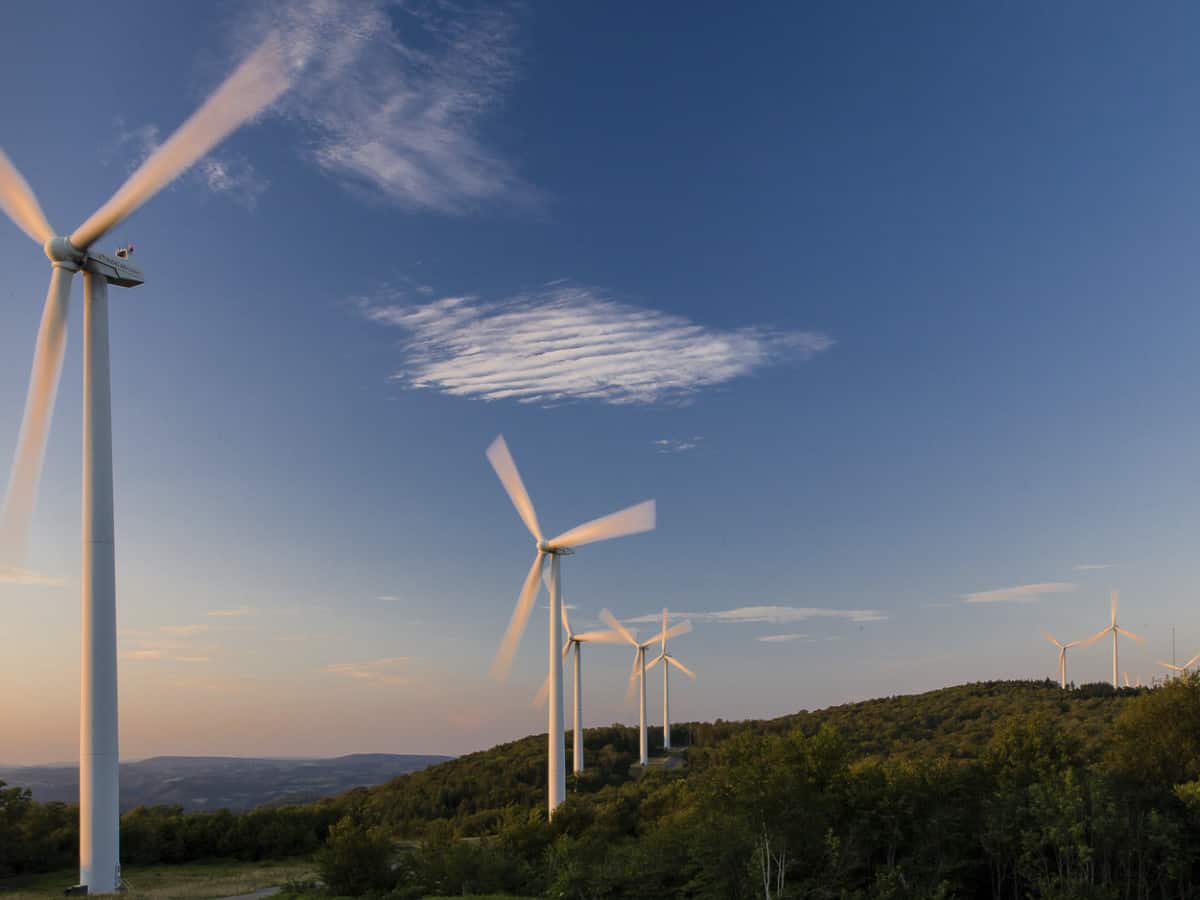 Wind farm turbines situated on a ridge top in the Appalachian mountains