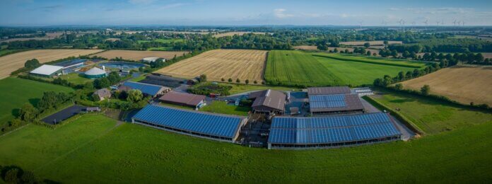 Aerial View Of Modern Agriculture Livestock Farm With Photovoltaic Panels Agricultural Microgrids