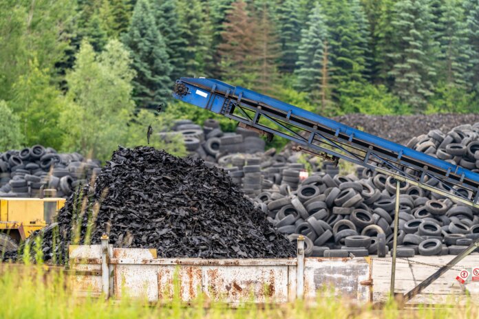Recycling And Processing Of Old Tires Crushed Rubber Go On